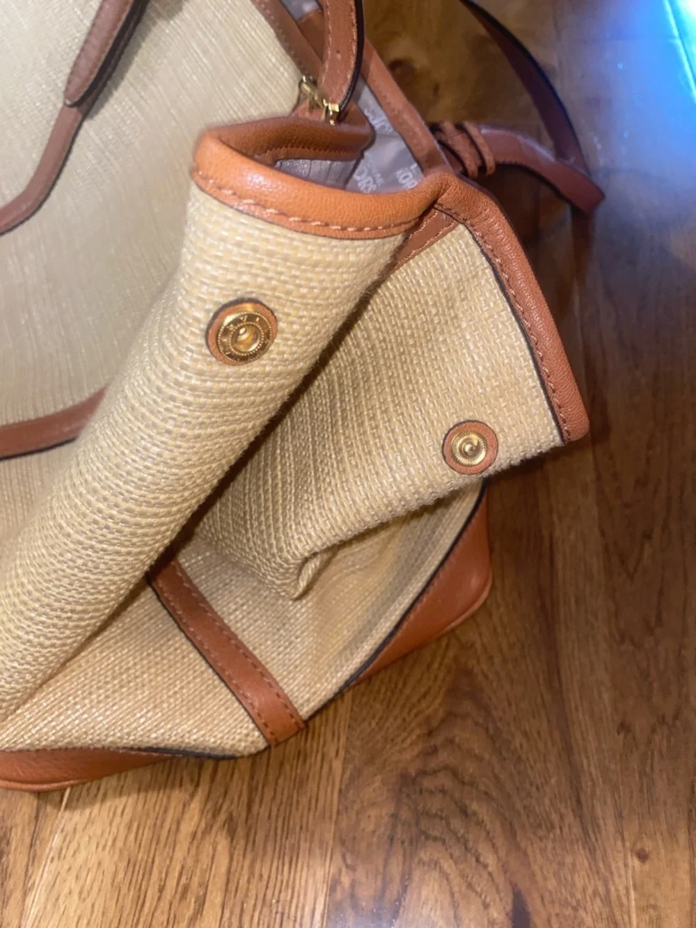 Michael Kors Raffia Tote with Tan Leather Trim and handles.